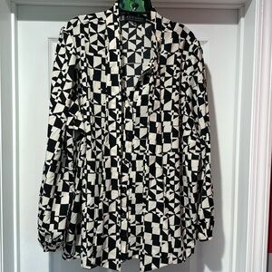 Gorgeous blouse with neck tie detail